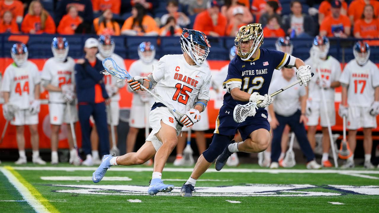 Sam English drives with the ball for the Syracuse men's lacrosse team.