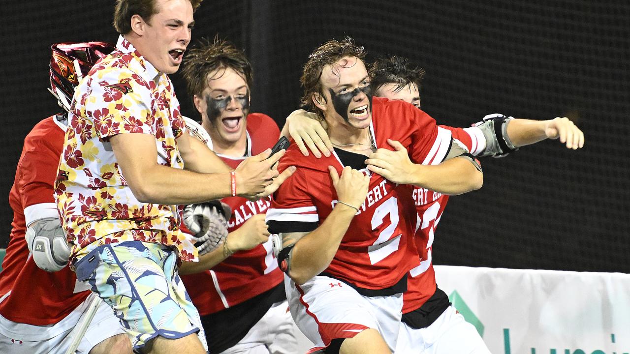 Jackson Mitchell gets mobbed by Calvert Hall (Md.) teammates after scoring the game-winning goal in the MIAA championship.
