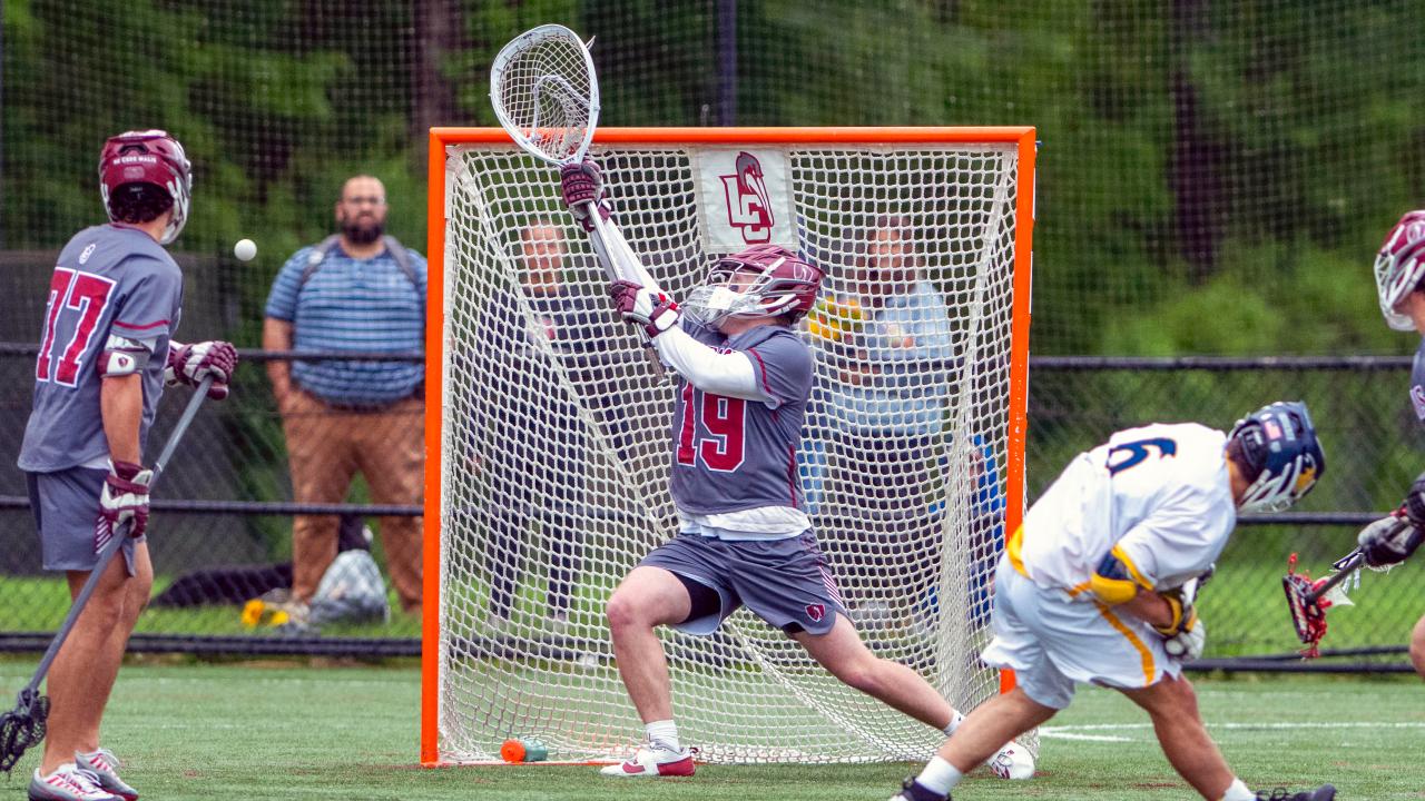 Loomis Chaffee (Conn.) goalie Liam O'Keefe makes a save