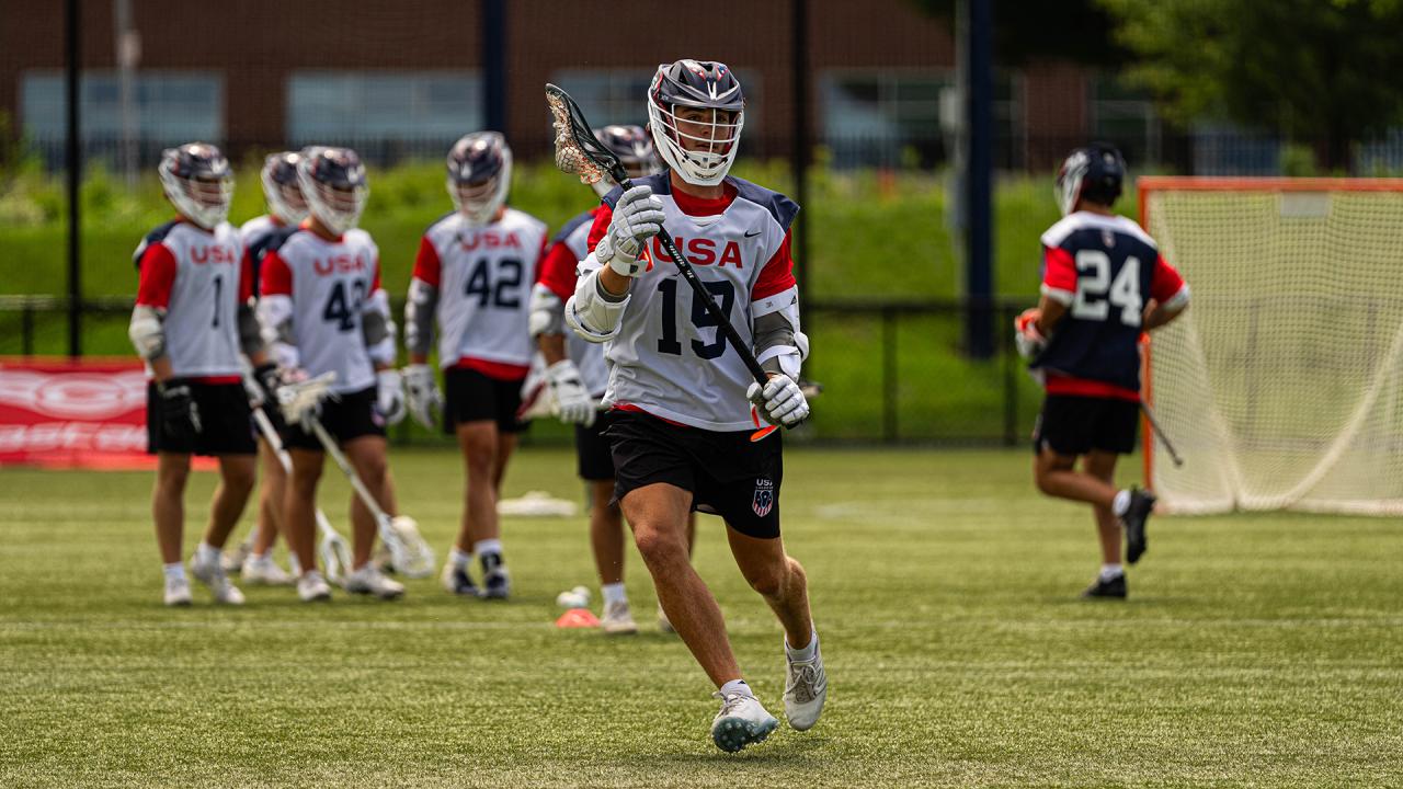 Brendan Millon runs with the ball at a USA training camp in 2024