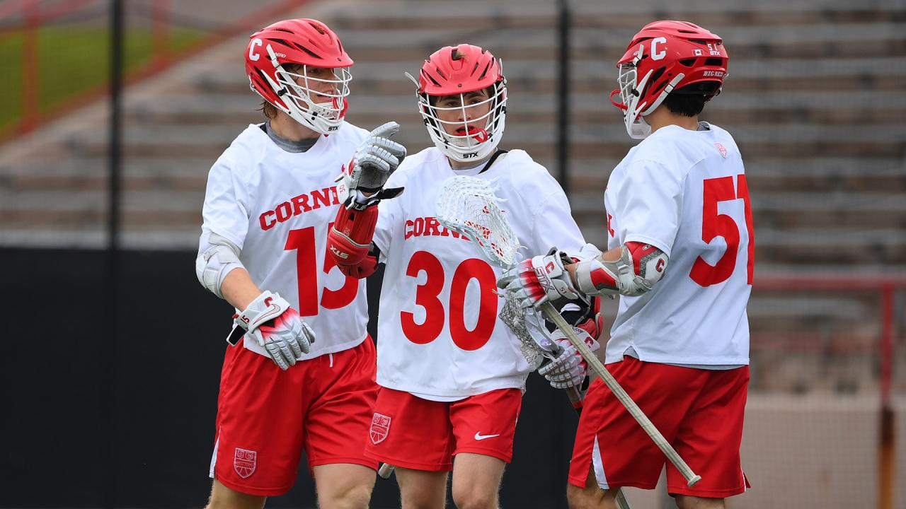 Cornell's C.J. Kirst, Ryan Goldstein and Wiliam Firth huddle up