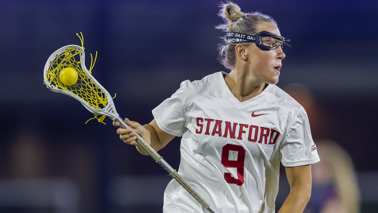Stanford women's lacrosse player Lindsey Devir dodges with ball up field in the ACC quarterfinals against Syracuse in Charlotte, N.C.