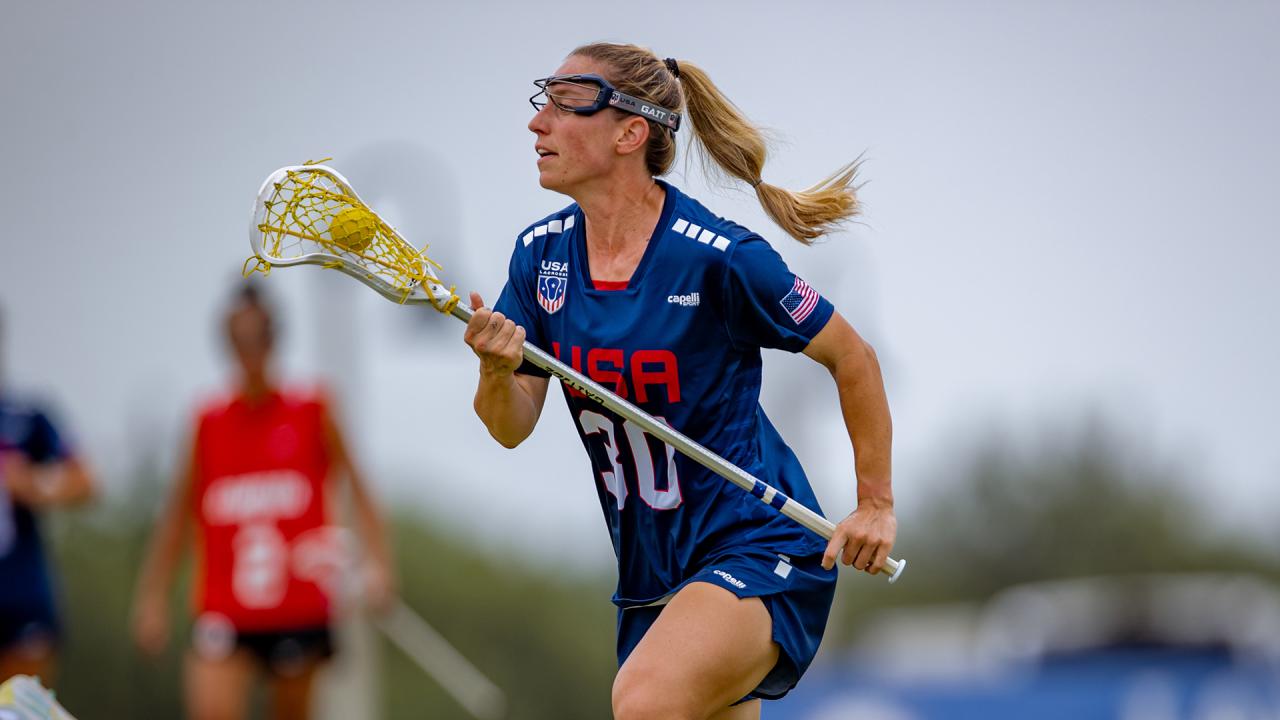 Ally Kennedy carries the ball against Canada during the Pan-American lacrosse championship