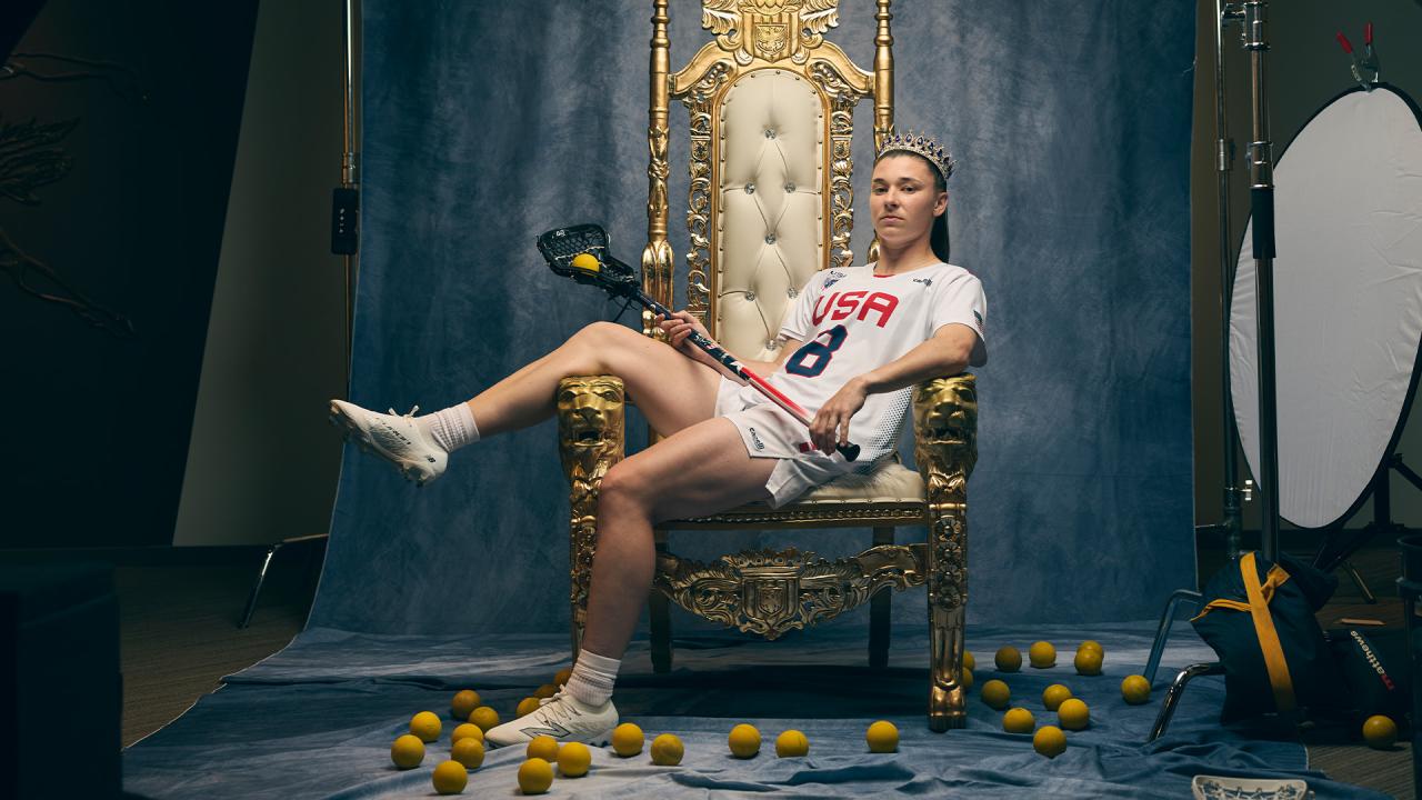 Charlotte North sits on a gold throne staged in the National Lacrosse Hall of Fame at USA Lacrosse headquarters in Sparks, Md.