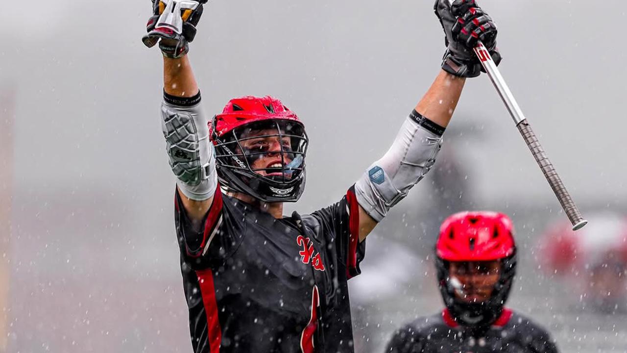 Half Hollow Hills celebrates a goal in the rain