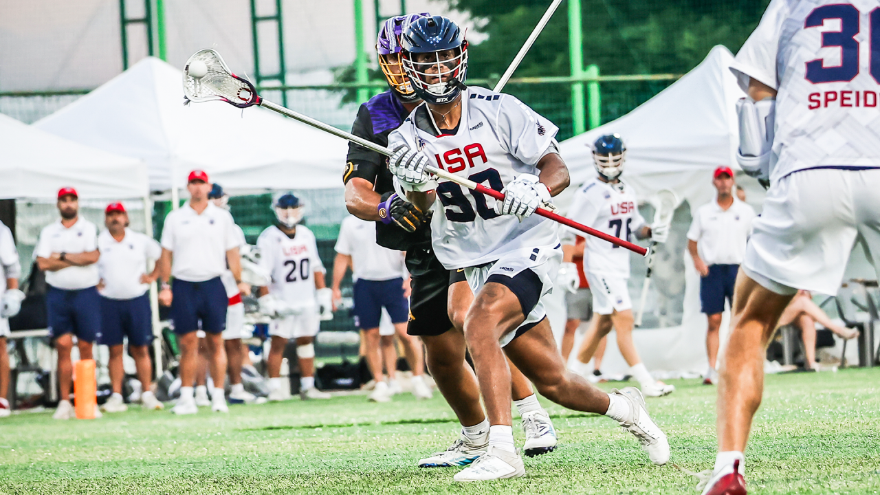 Shawn Lyght passes the ball to Jack Speidell transitioning up field during the World Lacrosse Men's U20 Championship semifinals Friday in South Korea.