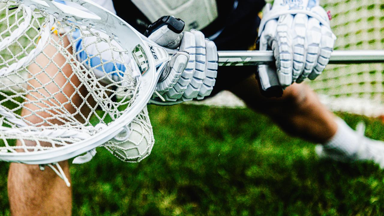 Image of lacrosse goalie making a save