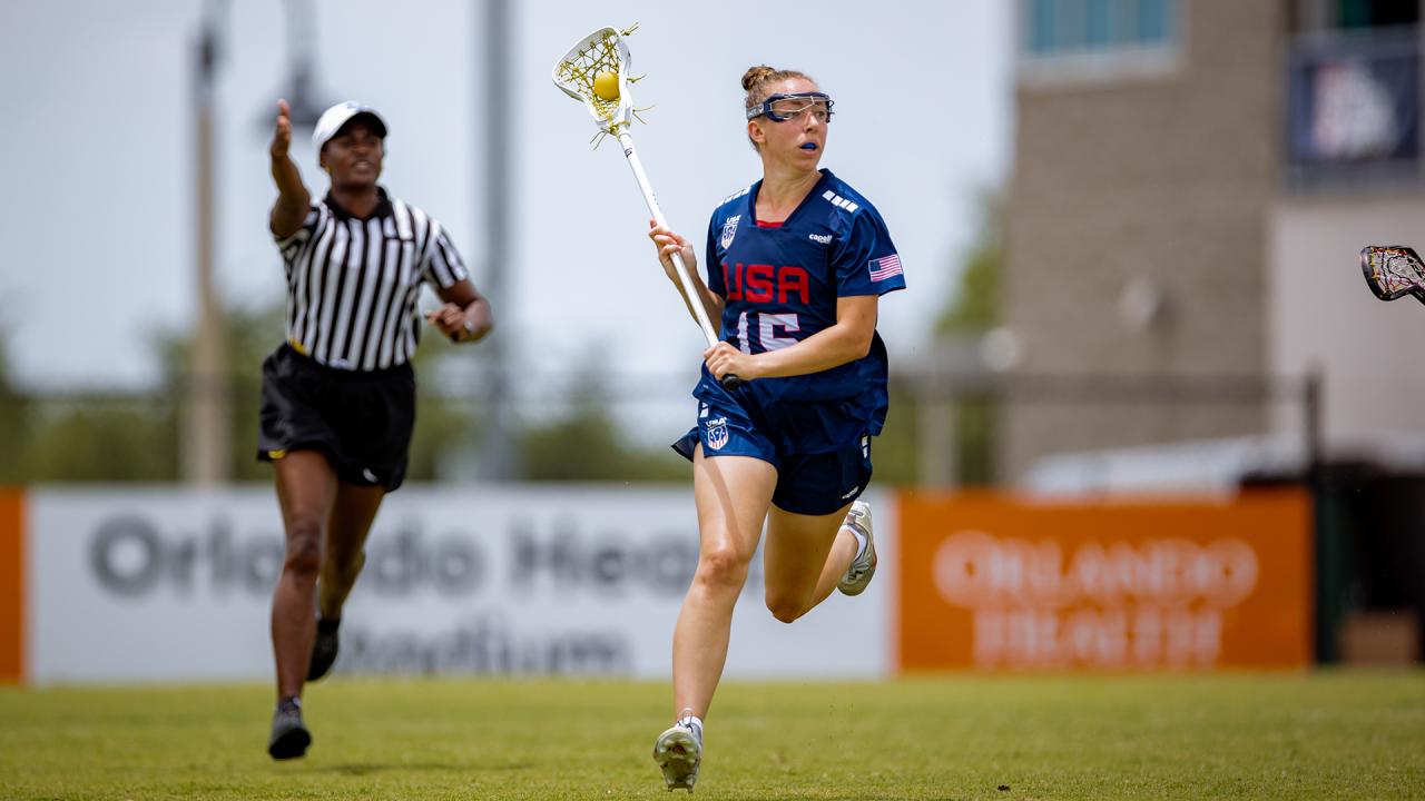 Emma Muchnick runs with the ball in her lacrosse stick during the Pan-American championship