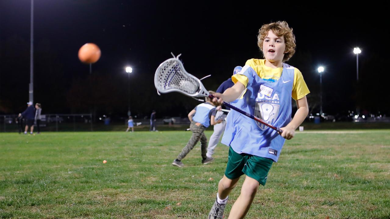 A youth player at a National Celebrate Lacrosse Week clinic in St. Louis in 2024