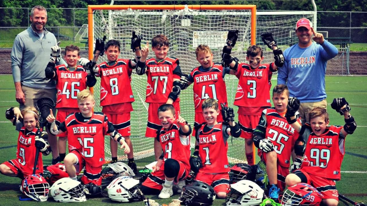 Berlin Youth Lacrosse coach Scott Rossi with one of his youth teams