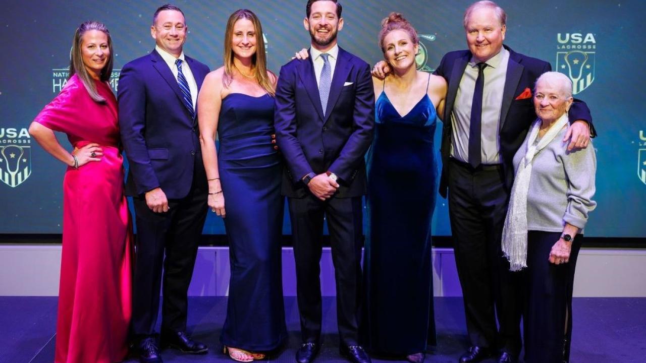 National Lacrosse Hall of Fame Class of 2025 inductees on stage during the induction ceremony Jan. 10 in Baltimore