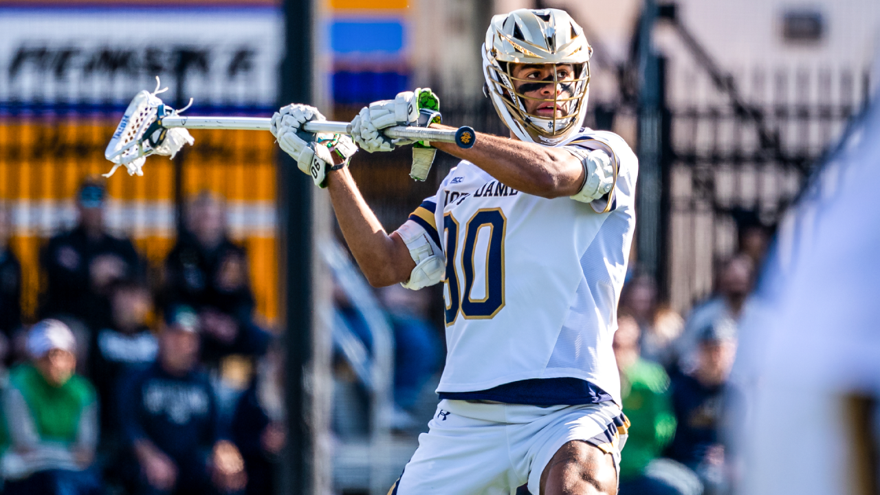 Notre Dame men's lacrosse defenseman Shawn Lyght rears back to throw a pass in a game against Virginia at Arlotta Stadium in South Bend, Ind.