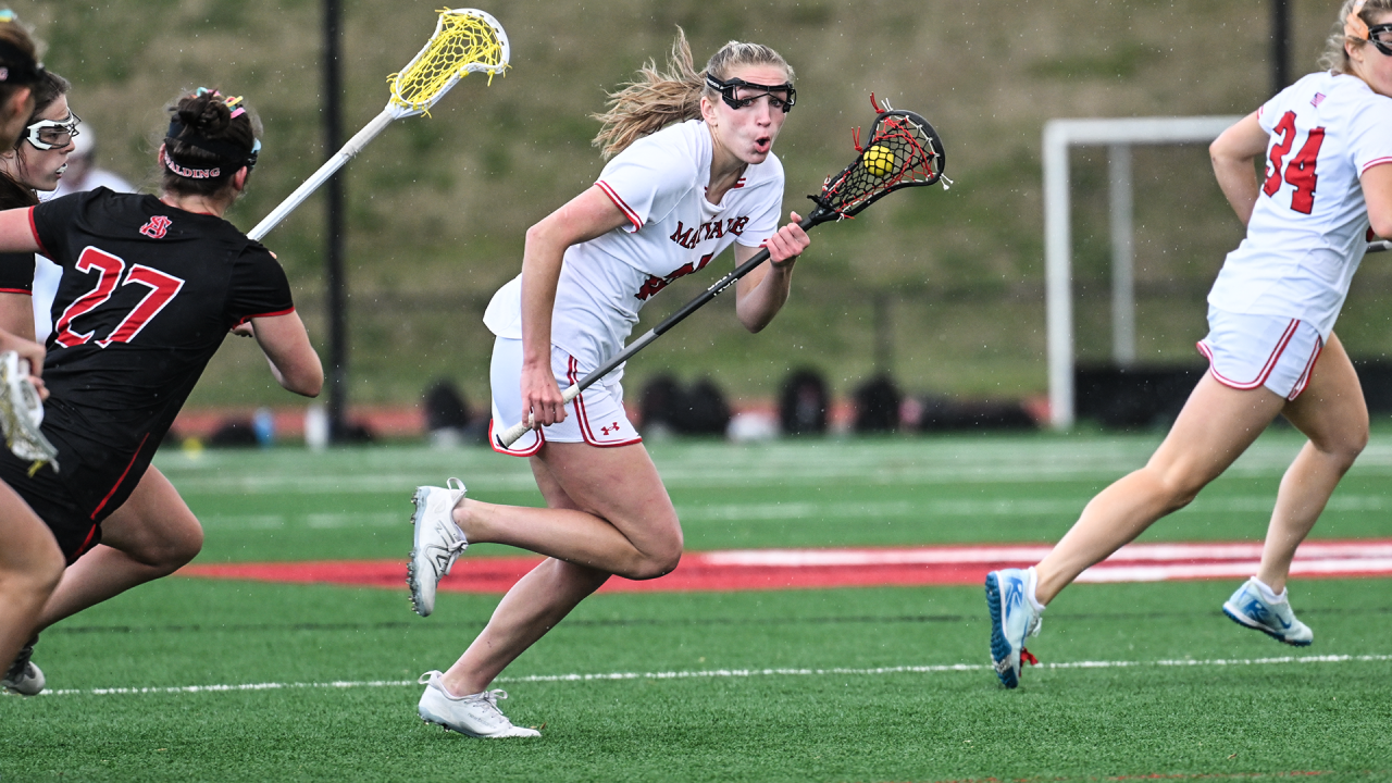 Maryvale (Md.) girls' lacrosse player Cayden Reese cradles the ball up the field during a game against Archbishop Spalding (Md.)