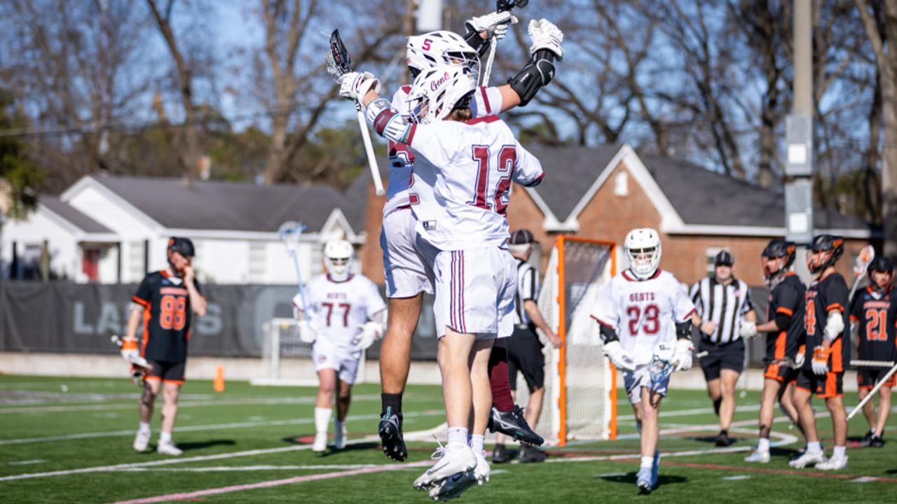 Centenary men's lacrosse players celebrate a goal