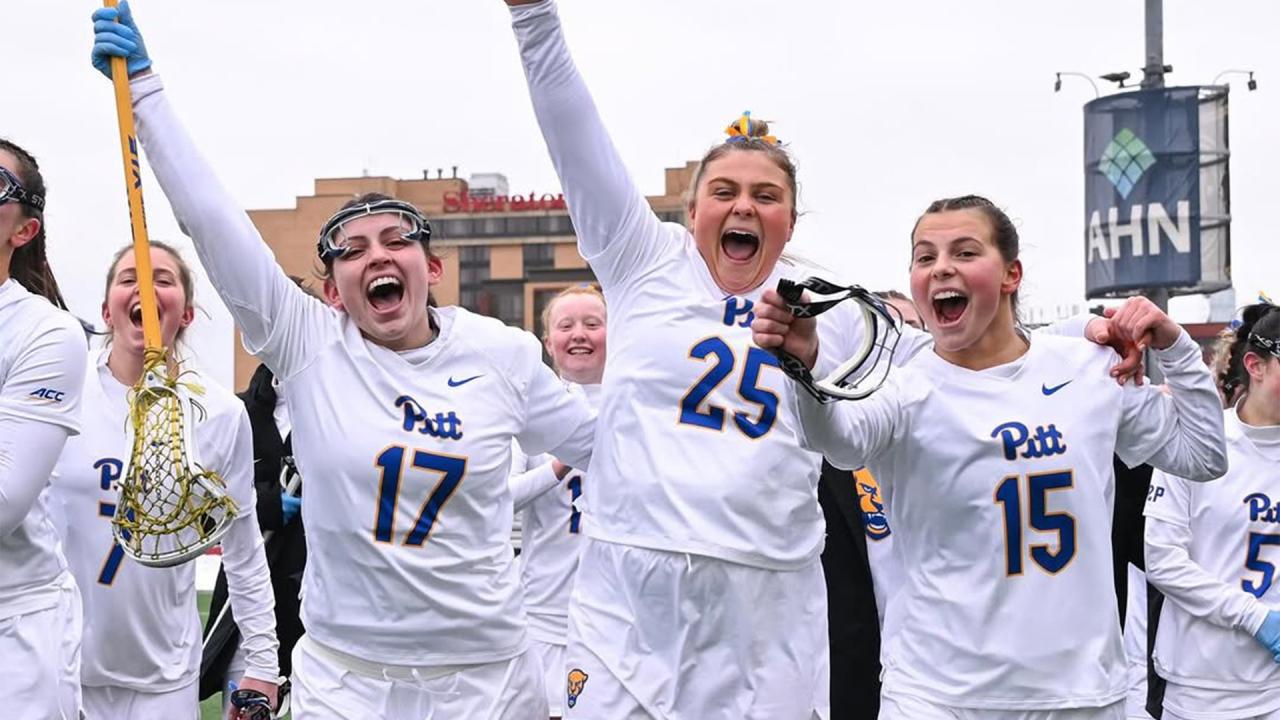 Pitt players celebrate their win over Duke
