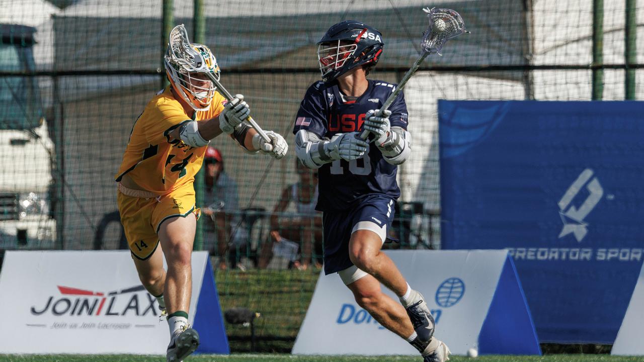 Rowyn Nurry drives with the ball against an Australian defender