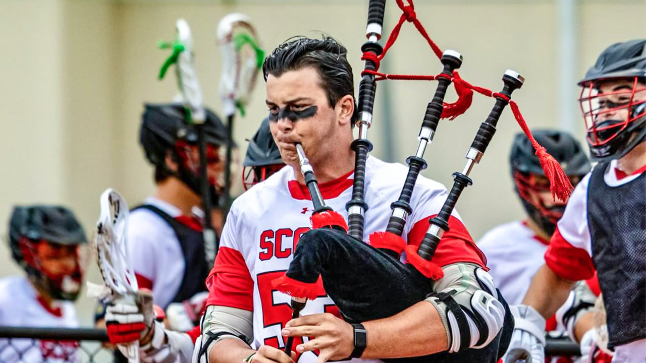 St. Andrew's (Fla.) boys lacrosse bagpiper leads team to field