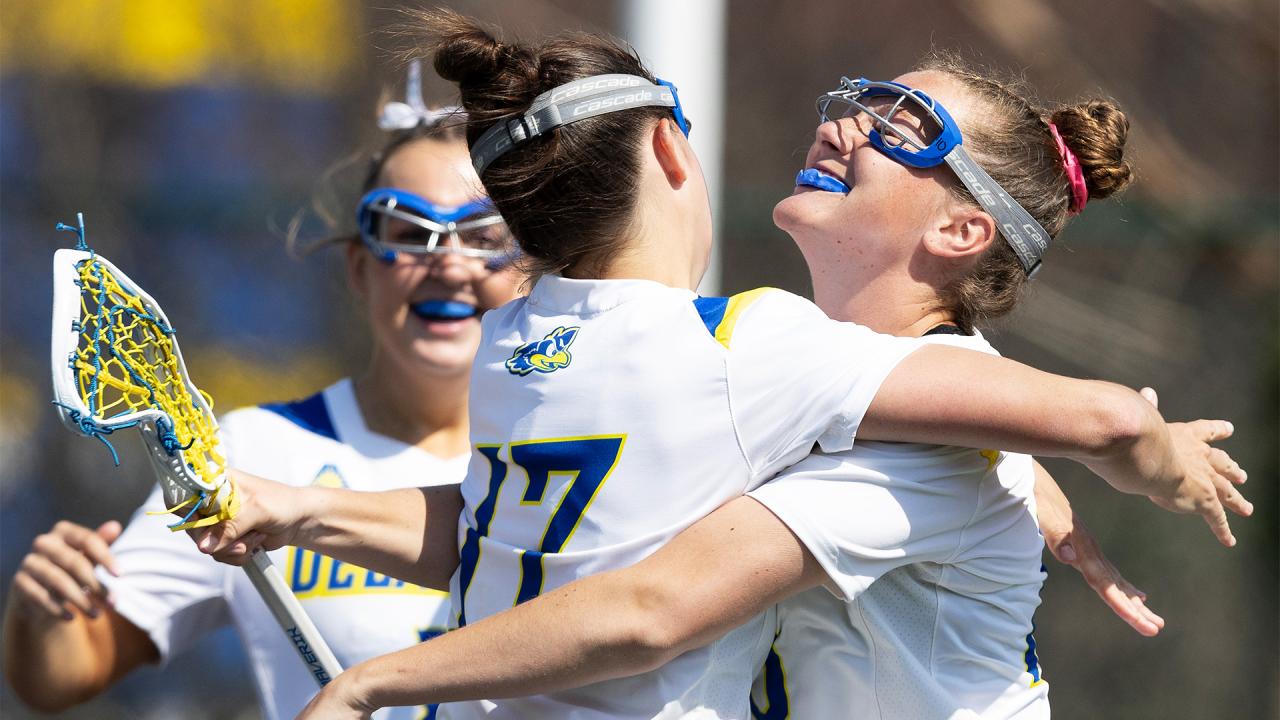 Delaware players celebrate a goal against Jacksonville