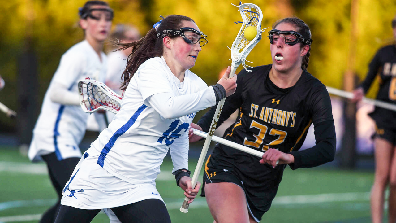 Quin Chandler of Darien (Conn.) running up the field with the ball against visiting St. Anthony's (N.Y.)