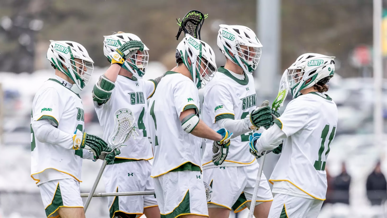 Siena men's lacrosse goal celebration as team