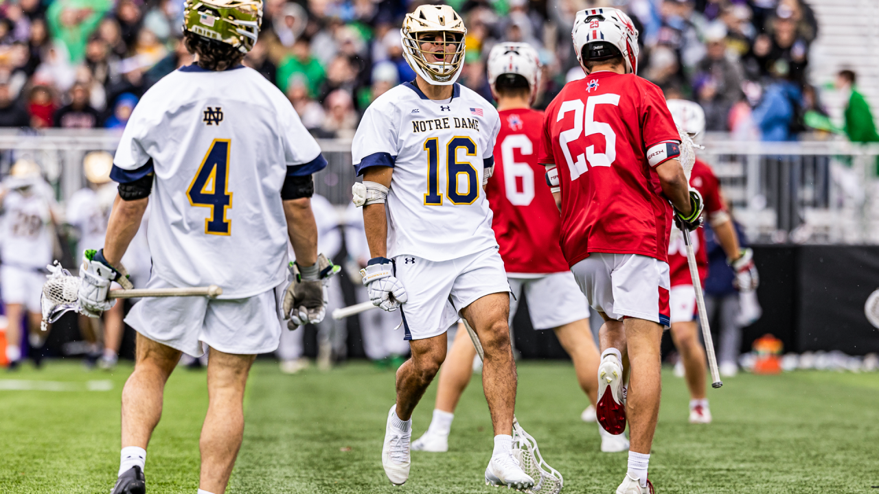 Will Maheras celebrates a goal with Matt Jeffrey looking to join him during Notre Dame's 12-8 win over Richmond at Northwestern Medicine Field at Martin Stadium.