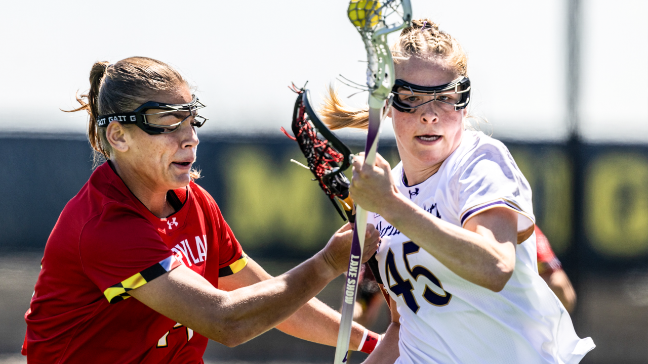 Northwestern's Annabel Child drives against Maryland's Kori Edmondson in the Big Ten championship game