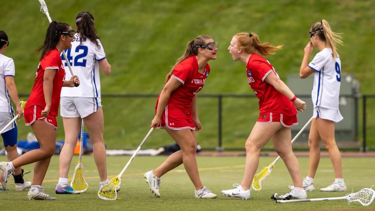 Cortland women's lacrosse celebrates a goal vs. Colby
