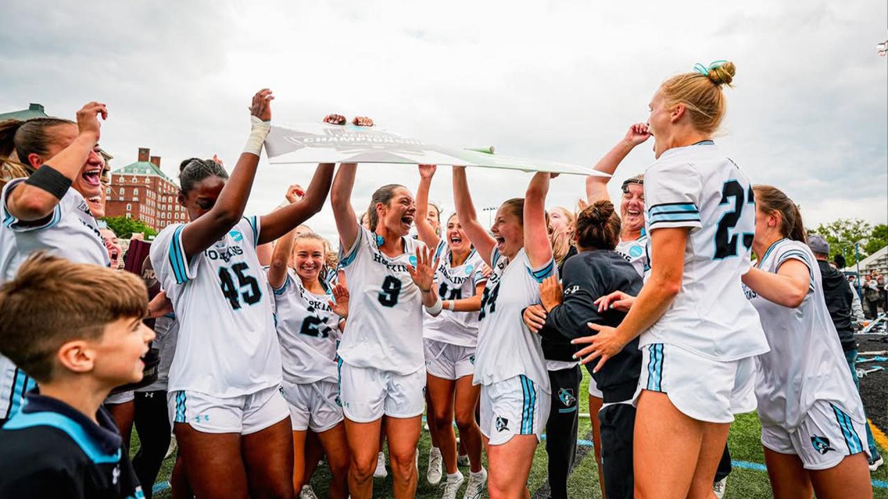 Reagan O'Brien and JHU teammates celebrate