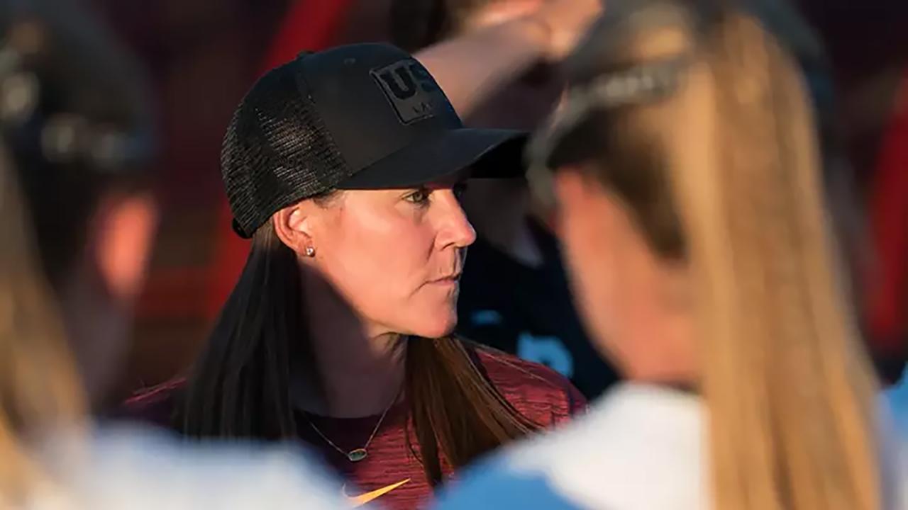 Lindsey Munday on the sideline with a black USC hat