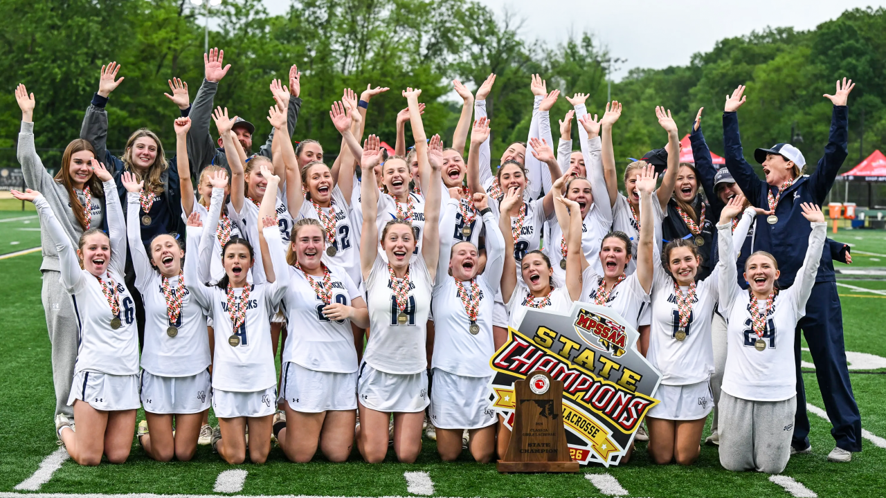Manchester Valley (Md.) girls' lacrosse team celebrates its 2026 state championship with banner and trophy
