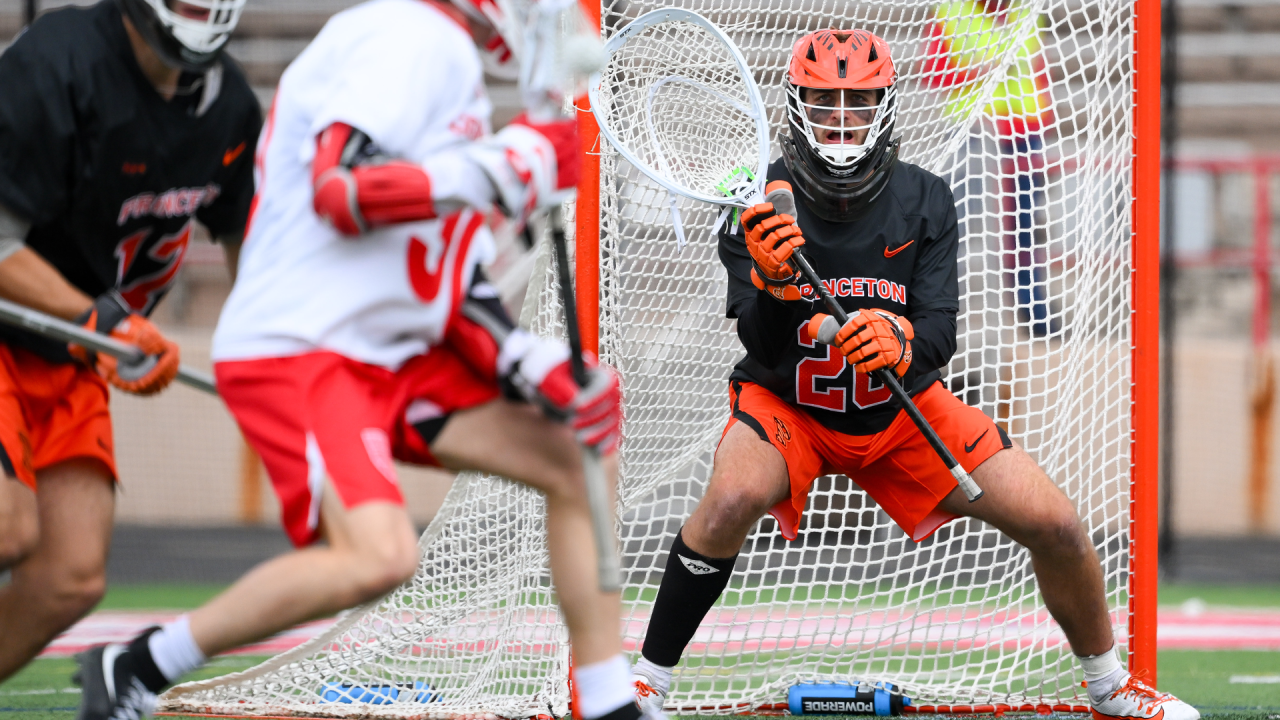 Princeton's Ryan Croddick guards the goal as the play unfolds in front of him during the Ivy League championship game at Cornell.