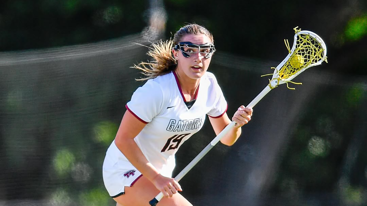 Sacred Heart Prep (Calif.) girls' lacrosse player with ball in stick