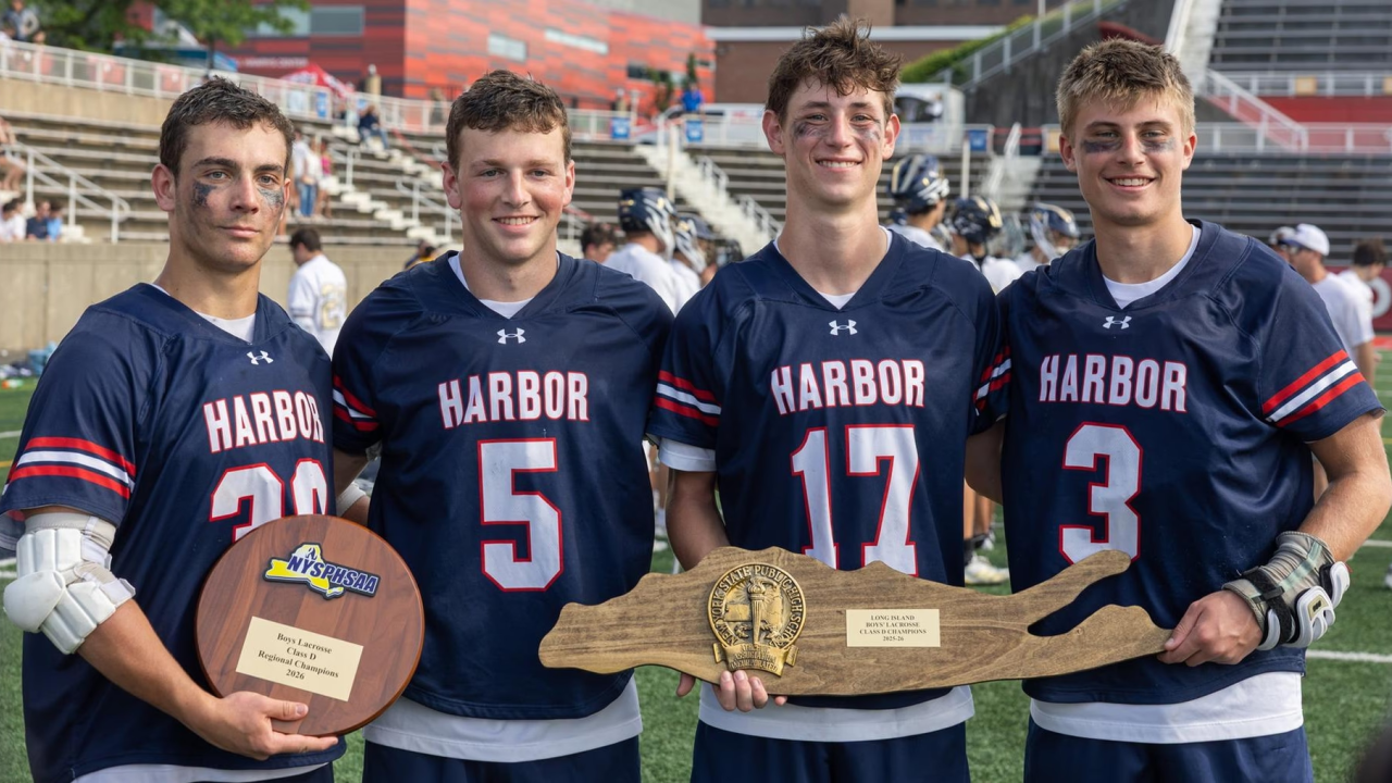 Cold Spring Harbor (N.Y.) lacrosse players with Long Island championship trophy