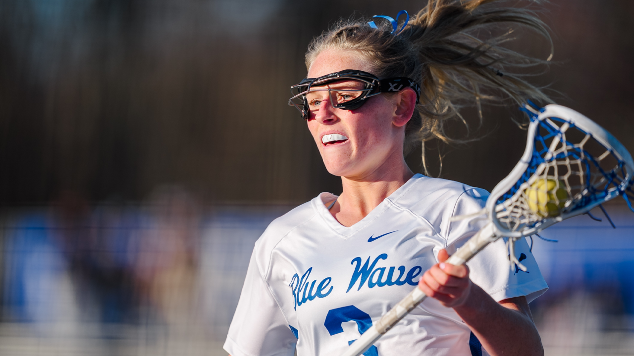 A Darien (Conn.) girls' lacrosse player in action against St. Anthony's (N.Y.)