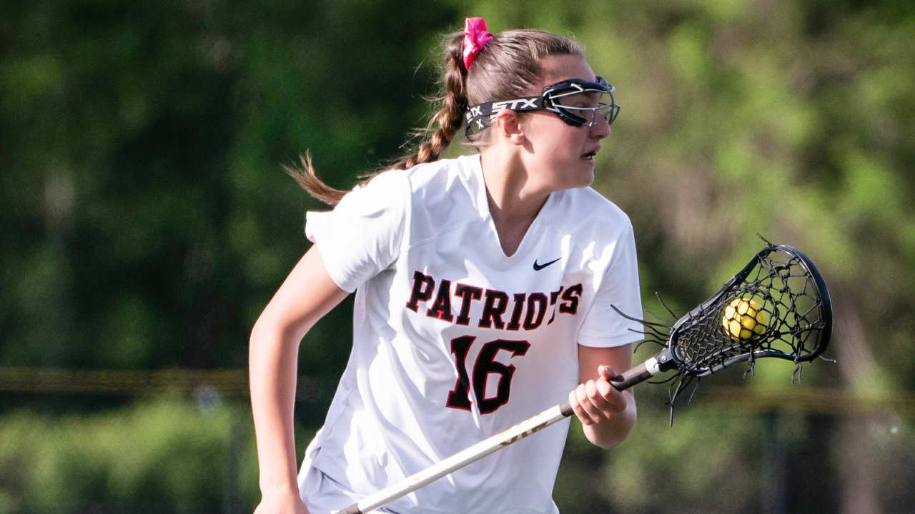 Penfield (N.Y.) girls' lacrosse player action photo