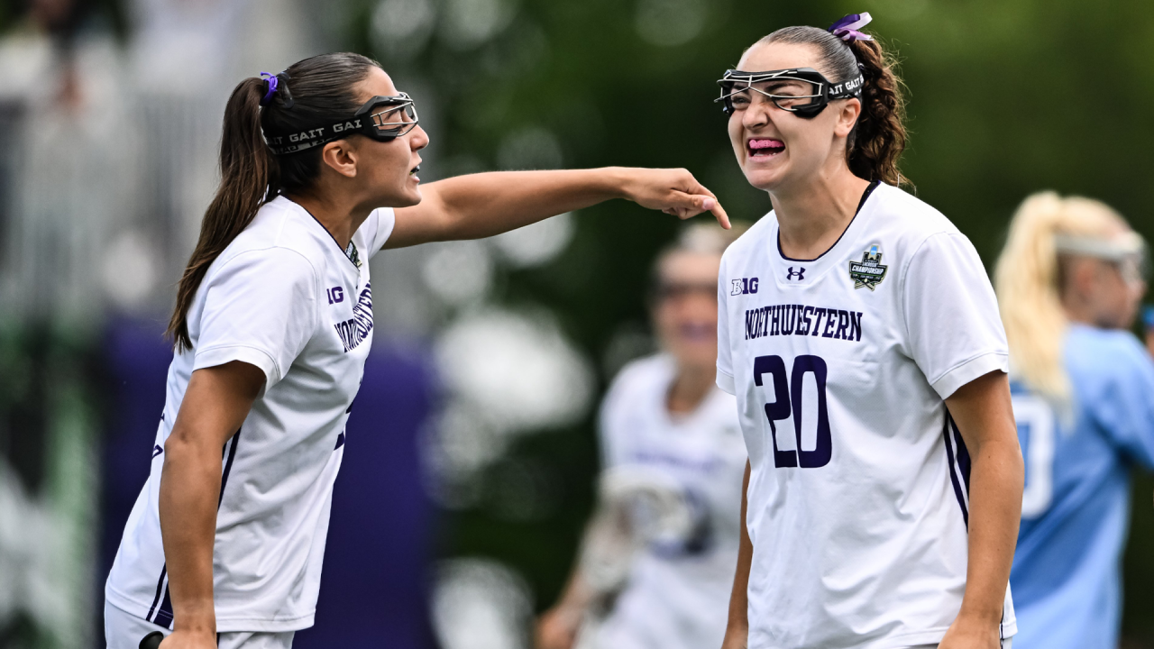Aditi Foster daps up Maddie Epke after Epke's goal in the NCAA Division I women's lacrosse championship game in Evanston, Ill.
