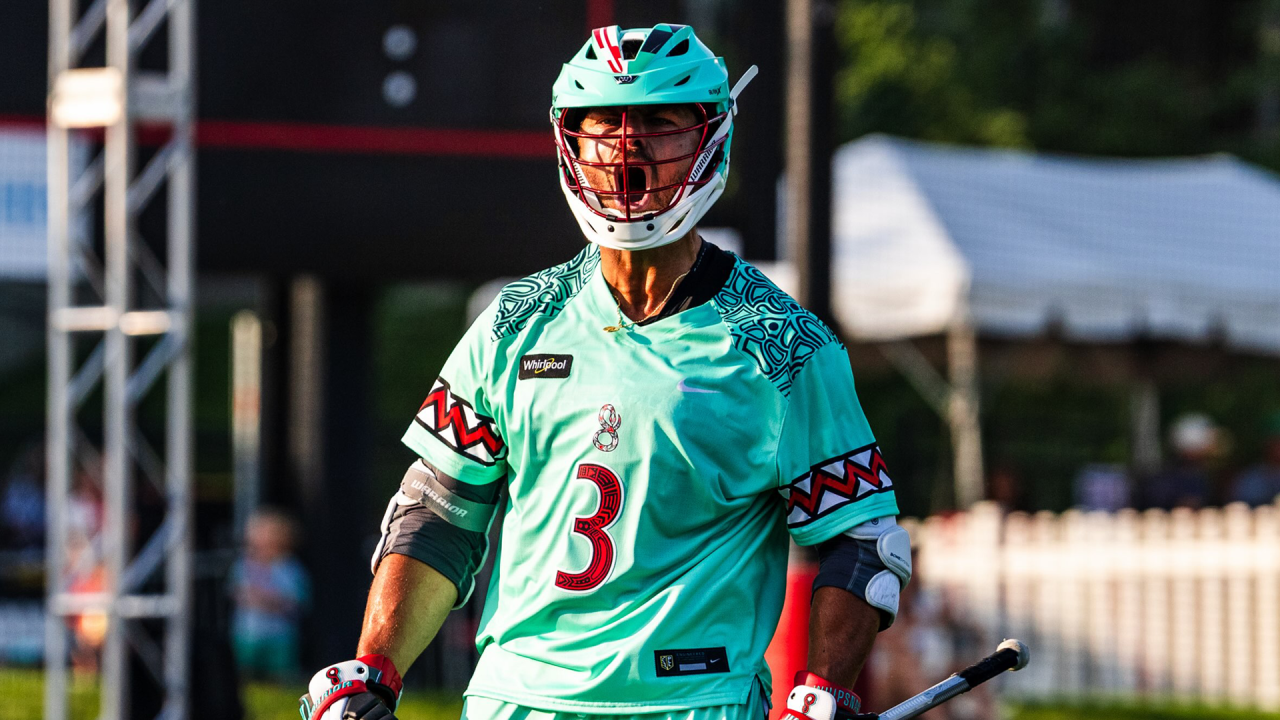 Rob Pannell roars after scoring a goal for his record 658th career point as a professional field lacrosse player.
