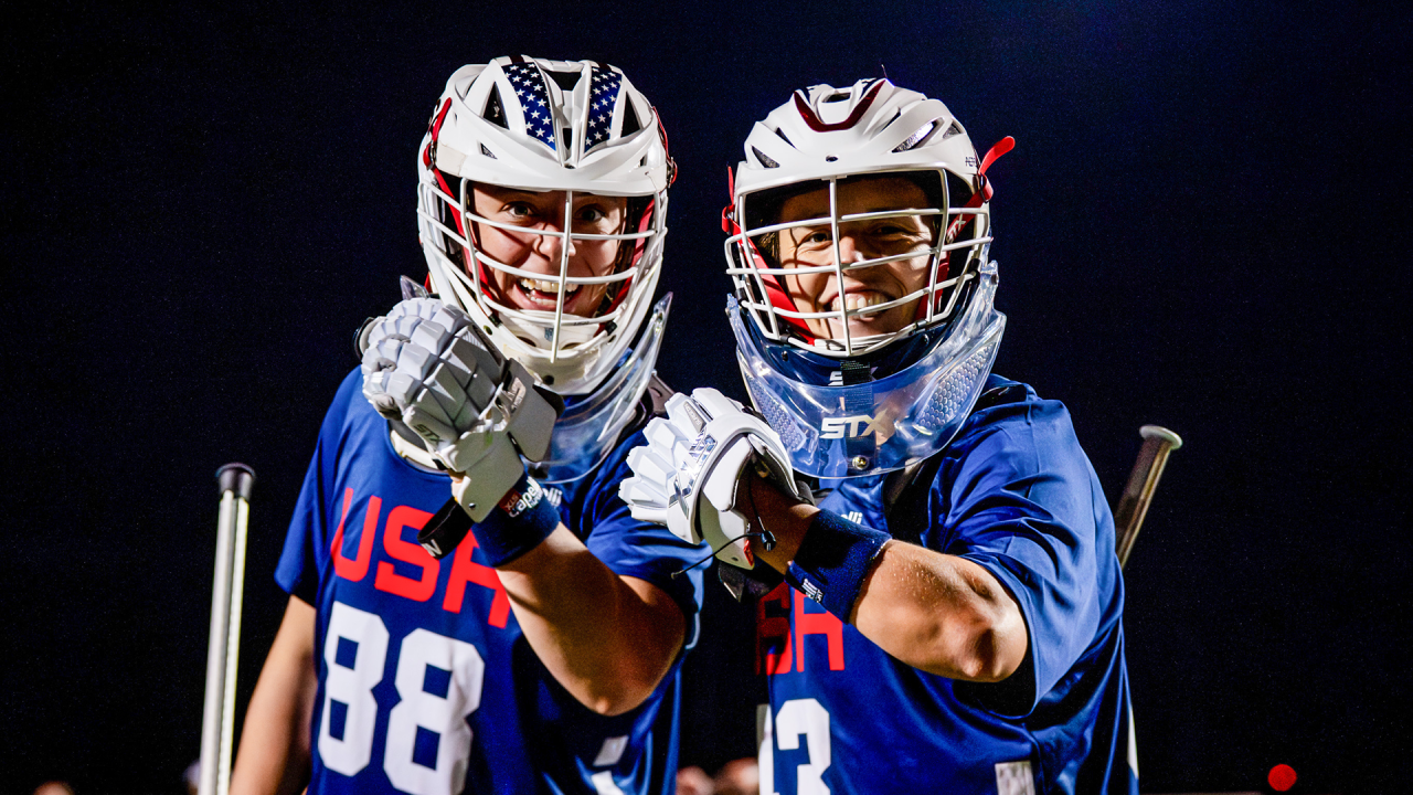 Goalies Shea Dolce (88) and Caylee Waters raise gloved fists toward camera during U.S. Women's National Team training camp in Dallas in January 2026.