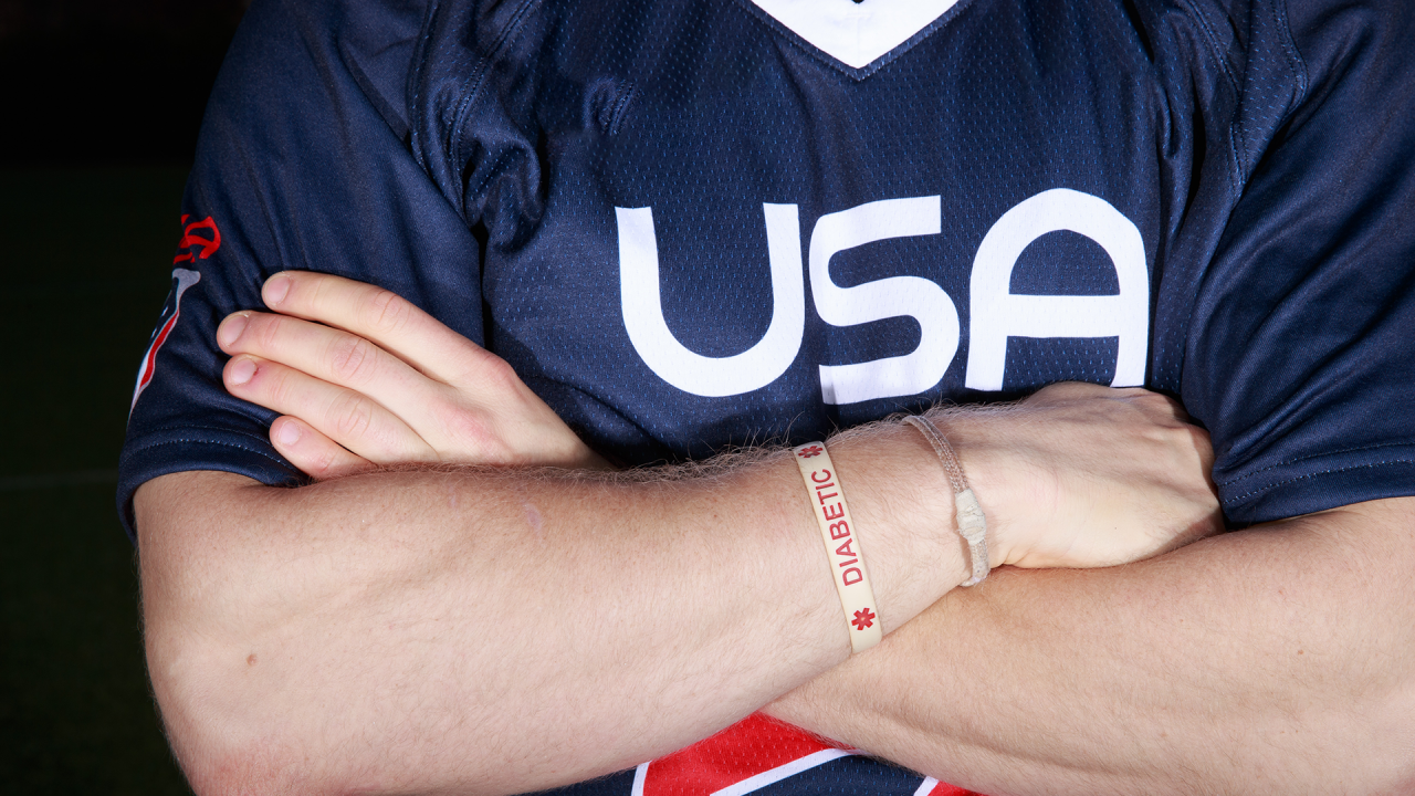 Fortmer Team USA faceoff specialist Chris Eck wore a wristband with Diabetic inscribed on it