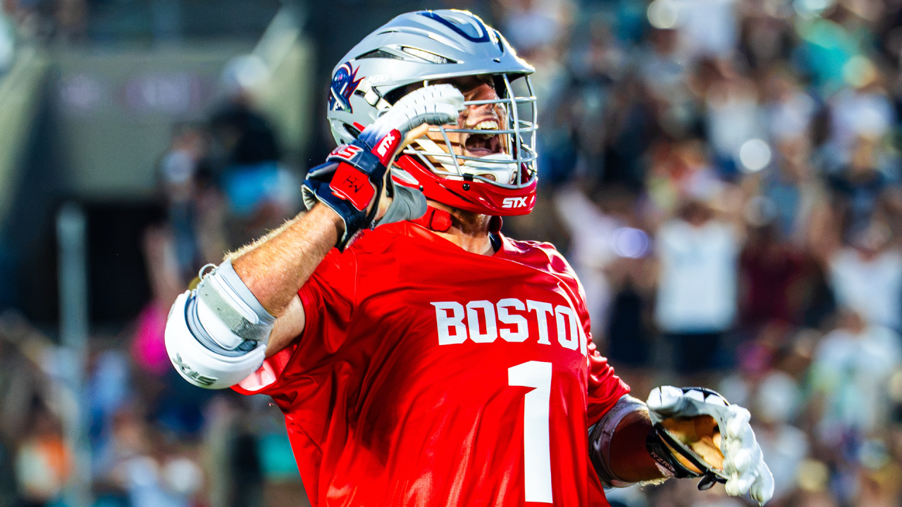 Boston Cannons attackman Marcus Holman howls at the home crowd at Harvard Stadium in Cambridge, Mass., after scoring the winning 2-pointer in overtime. at 