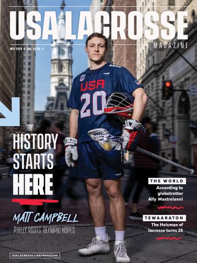 USA Lacrosse Magazine May 2026 edition cover featuring pro lacrosse player Matt Campbell pictured on Broad Street in Philadelphia in a portrait wearing his U.S. National Team uniform and holding his equipment