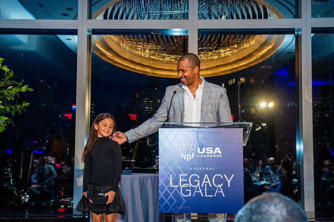 Kyle Harrison with his daughter at the 2022 USA Lacrosse Foundation Gala