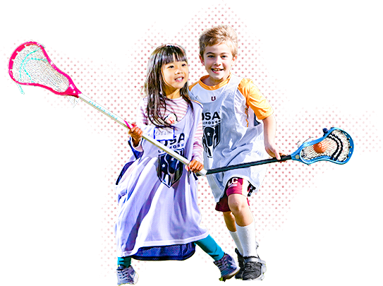 a boy and girl play lacrosse